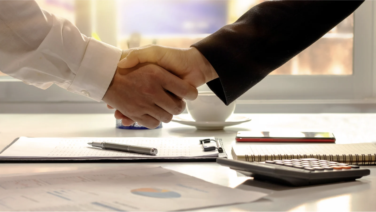 Partner handshake; Partner with LanguageBird to Expand Language Offering